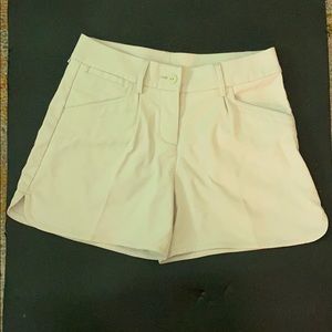 Puma Women’s golf shorts - never worn! Size 4.